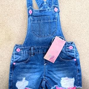 Girls coverall shorts. Denim with pink legging. Brand new never worn.